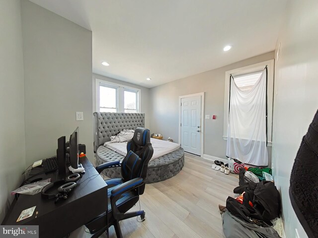 bedroom featuring light hardwood / wood-style flooring