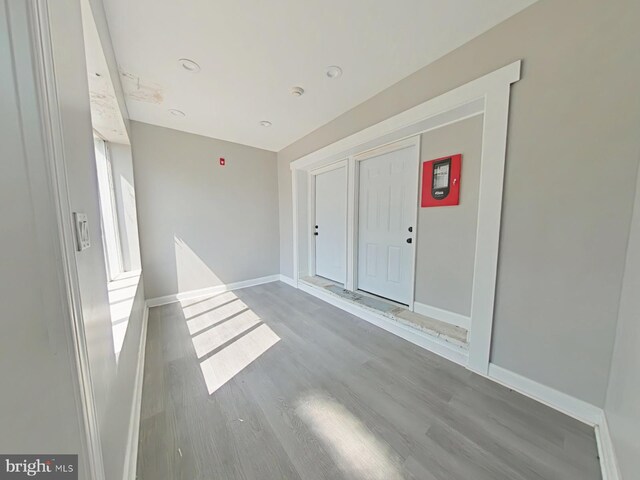 spare room featuring light hardwood / wood-style flooring