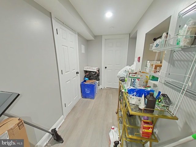 hallway featuring light hardwood / wood-style flooring