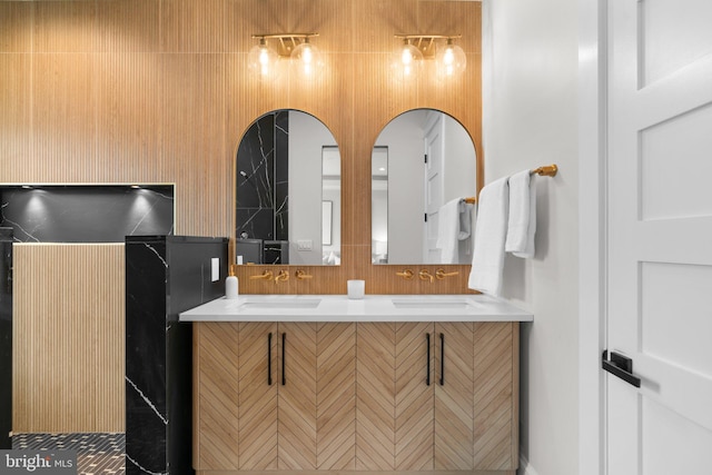 bathroom featuring tasteful backsplash and vanity