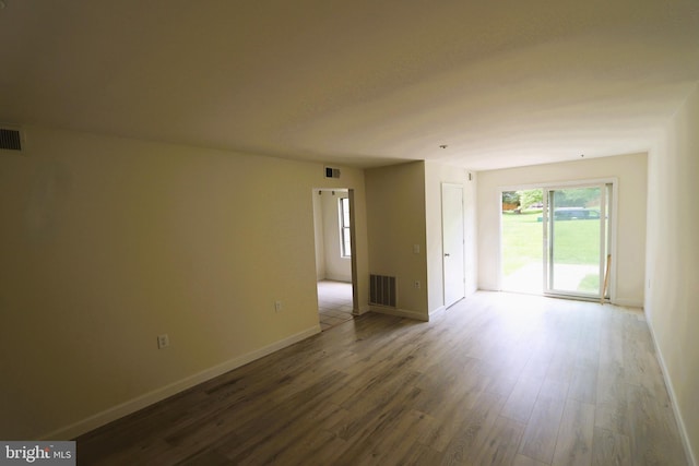 empty room featuring hardwood / wood-style floors