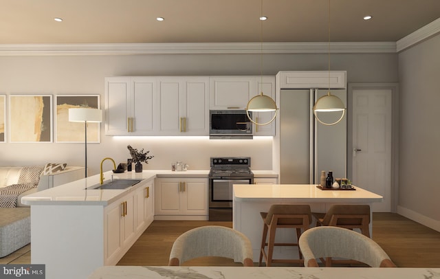 kitchen featuring sink, white cabinetry, ornamental molding, stainless steel appliances, and hardwood / wood-style floors