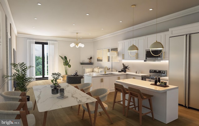 kitchen featuring white cabinetry, sink, a center island, and appliances with stainless steel finishes