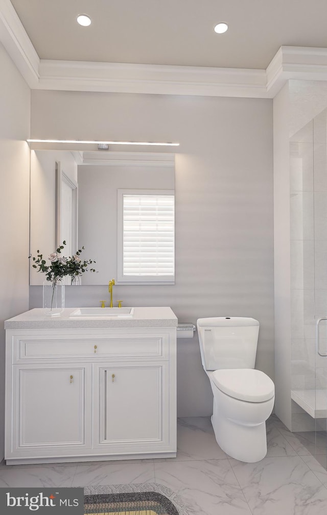 bathroom featuring vanity, a shower with door, ornamental molding, and toilet