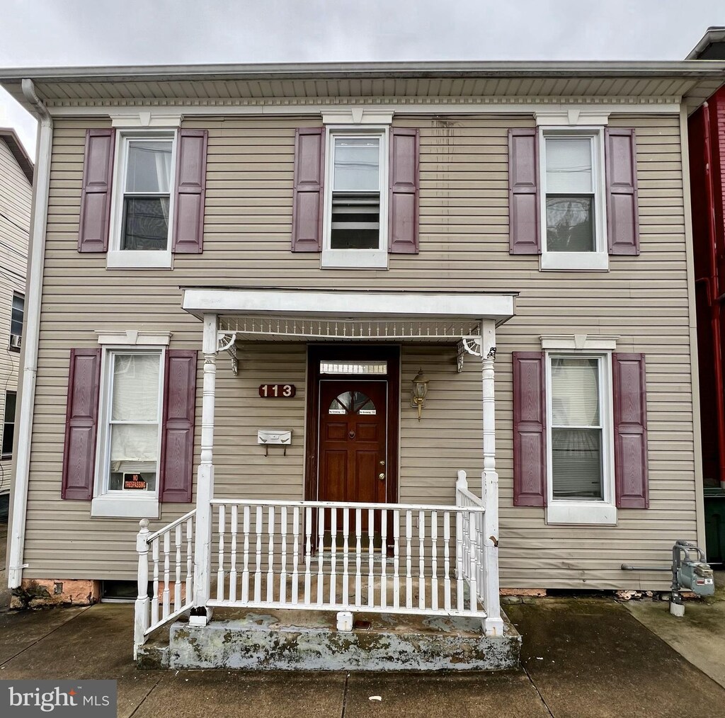 multi unit property featuring covered porch