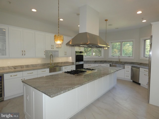 kitchen featuring island range hood, a kitchen island, and white cabinets