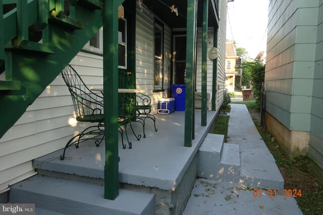 view of home's exterior with covered porch