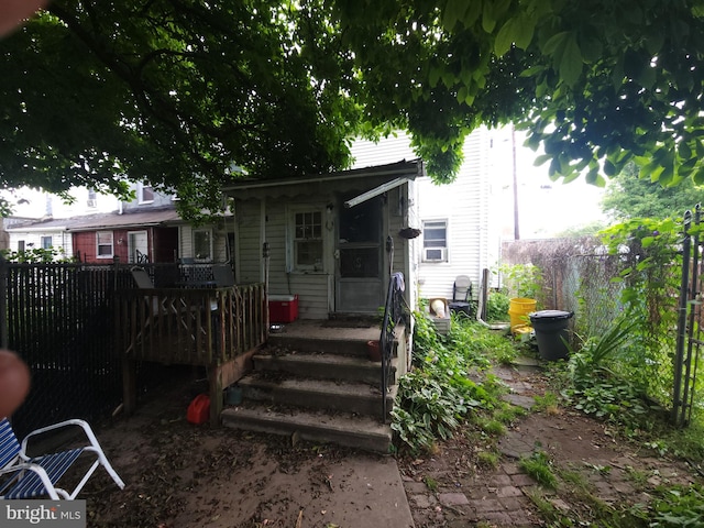 rear view of house with a deck