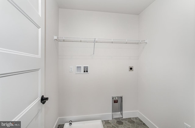 laundry room featuring washer hookup, hookup for an electric dryer, and tile patterned flooring