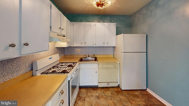 kitchen featuring backsplash, white cabinetry, white appliances, and sink