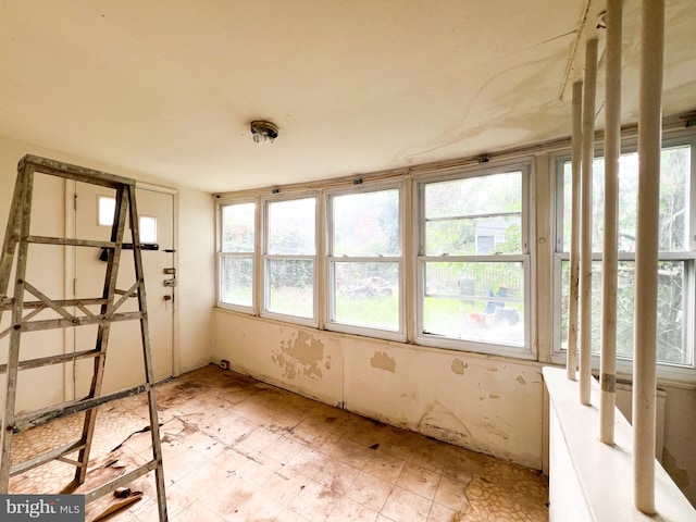 view of unfurnished sunroom