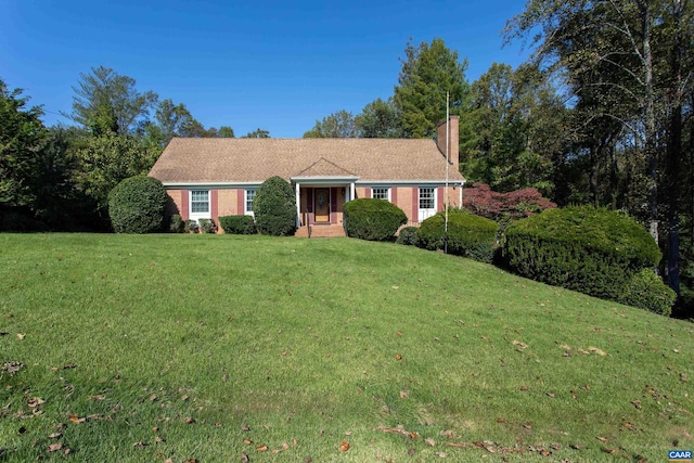 view of front of home with a front yard