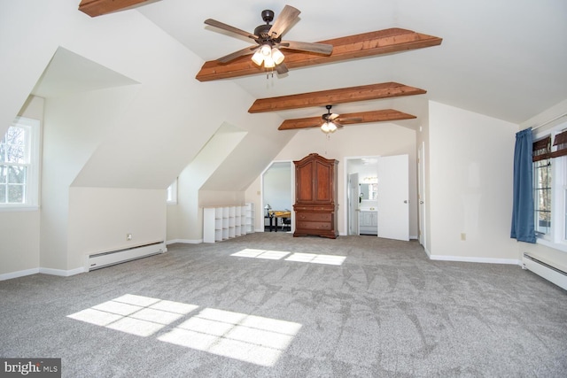 additional living space featuring a baseboard radiator, plenty of natural light, light colored carpet, and vaulted ceiling with beams