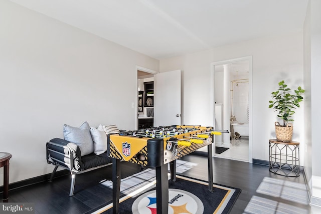 game room featuring dark hardwood / wood-style flooring