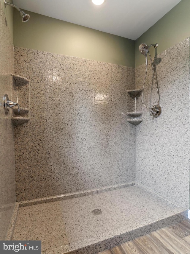 bathroom featuring walk in shower