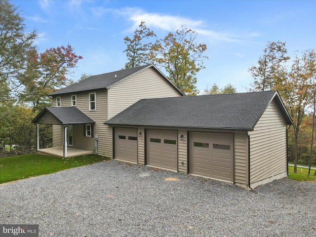 exterior space with covered porch and driveway