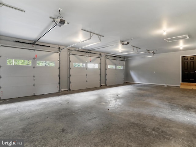 garage featuring a garage door opener