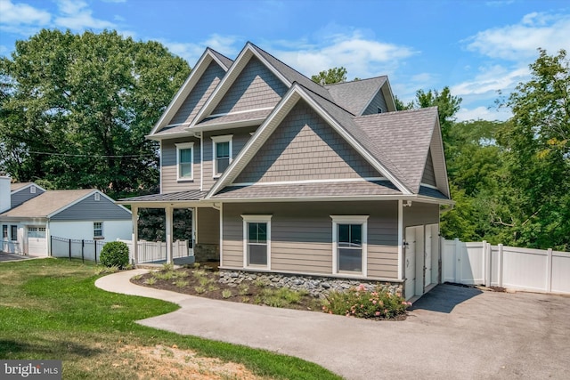 craftsman house with a front yard