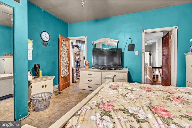 bedroom with light tile patterned floors