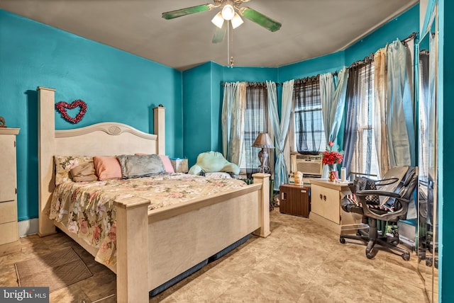 bedroom with light tile patterned floors and ceiling fan