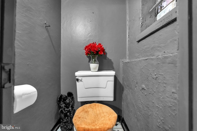 bathroom featuring toilet