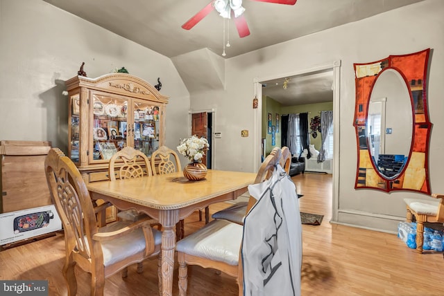 dining room featuring ceiling fan and light hardwood / wood-style flooring