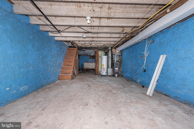 basement with heating unit and water heater