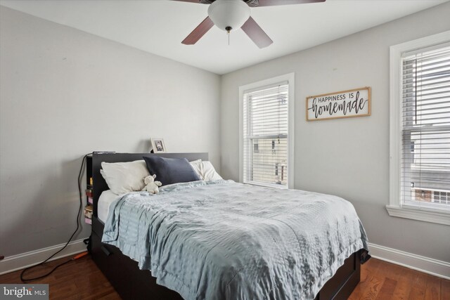 bedroom featuring ceiling fan and hardwood / wood-style floors