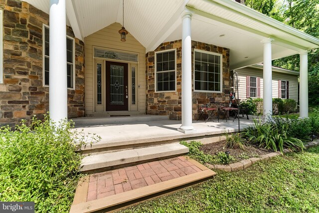 colonial inspired home with a front lawn