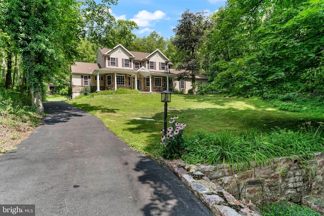 view of front of home with a front lawn