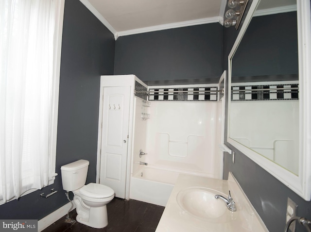 full bathroom featuring ornamental molding, shower / tub combination, vanity, and toilet