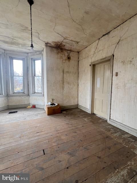 misc room with dark wood-type flooring