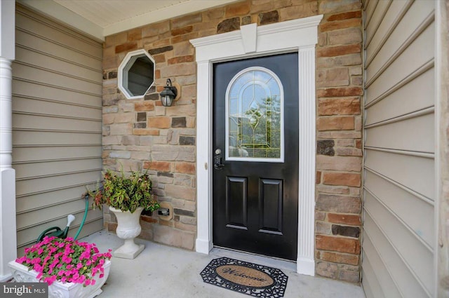 entrance to property with a porch