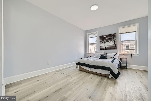 bedroom with light hardwood / wood-style floors