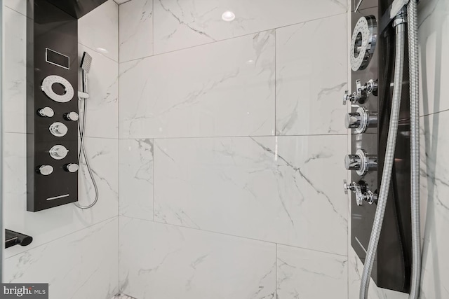 interior space with a tile shower