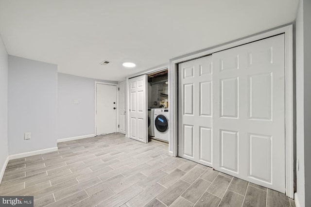 laundry room featuring washer / dryer