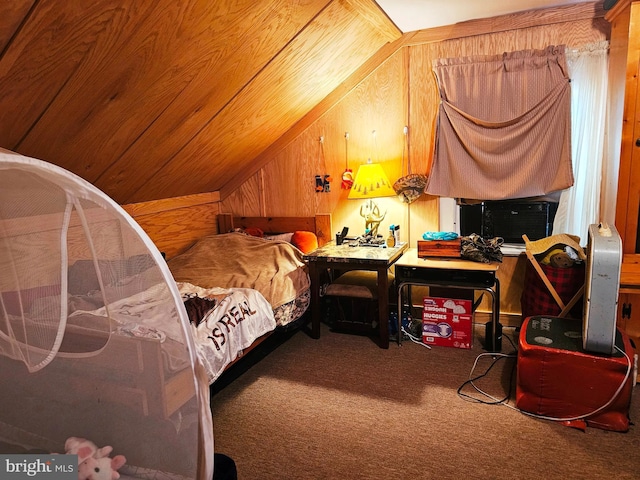 bedroom featuring vaulted ceiling, carpet, wood ceiling, and wood walls