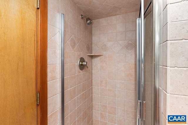 bathroom with an enclosed shower