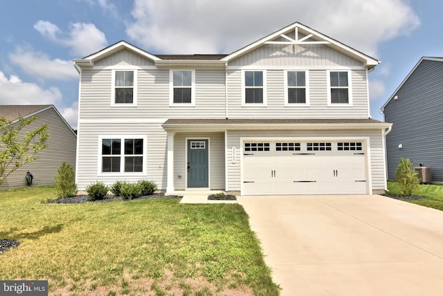 view of front facade with central AC, a garage, and a front yard