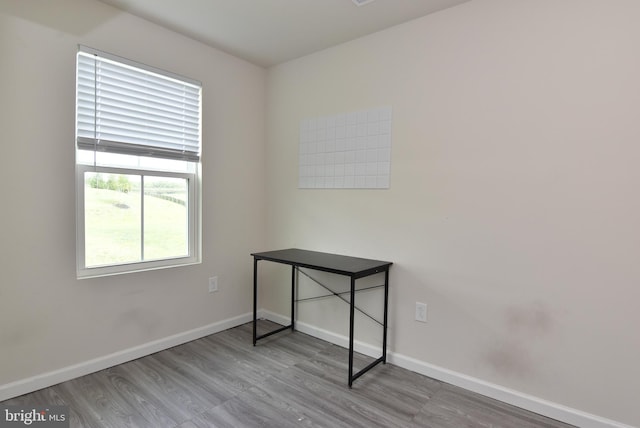 spare room with light hardwood / wood-style floors