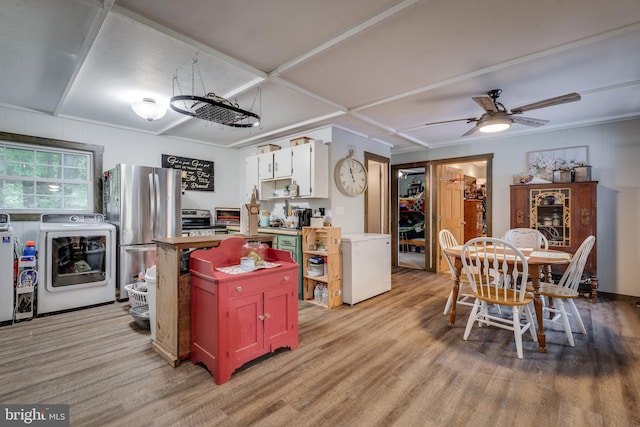 kitchen featuring stainless steel refrigerator, white cabinets, light wood-type flooring, and ceiling fan