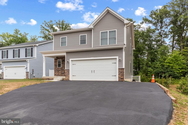 view of front of home featuring a garage