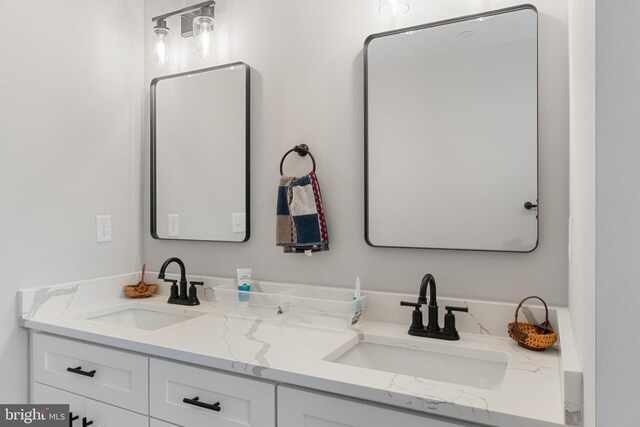 bathroom with dual vanity