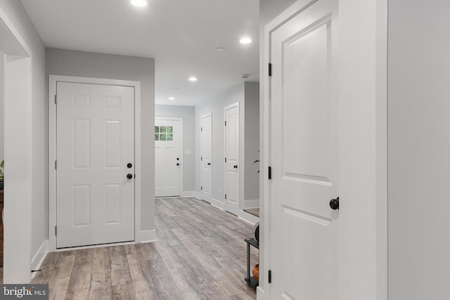 hallway featuring light hardwood / wood-style flooring