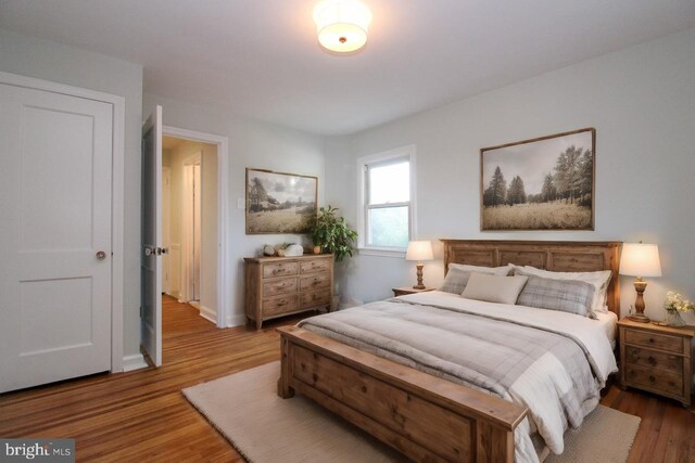 bedroom featuring hardwood / wood-style floors