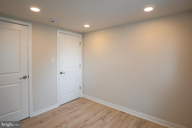 unfurnished bedroom with light hardwood / wood-style floors