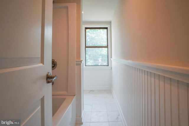 bathroom with tile patterned floors