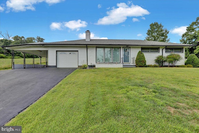 single story home with a garage, a carport, and a front lawn