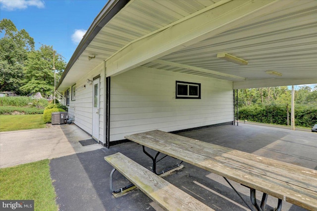 exterior space featuring central AC unit