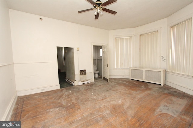 unfurnished bedroom with connected bathroom and ceiling fan